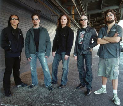 DREAM THEATER FIRMAN CON ROADRUNNER